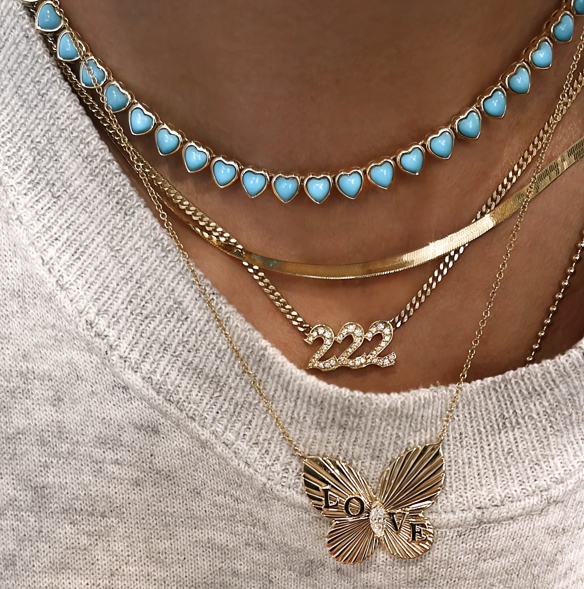 Yellow gold and diamond butterfly burst love necklace