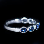 White Gold 1.50 CTW Oval Sapphire Band