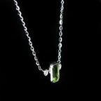 White Gold 0.60 Carat Peridot and Diamond Necklace