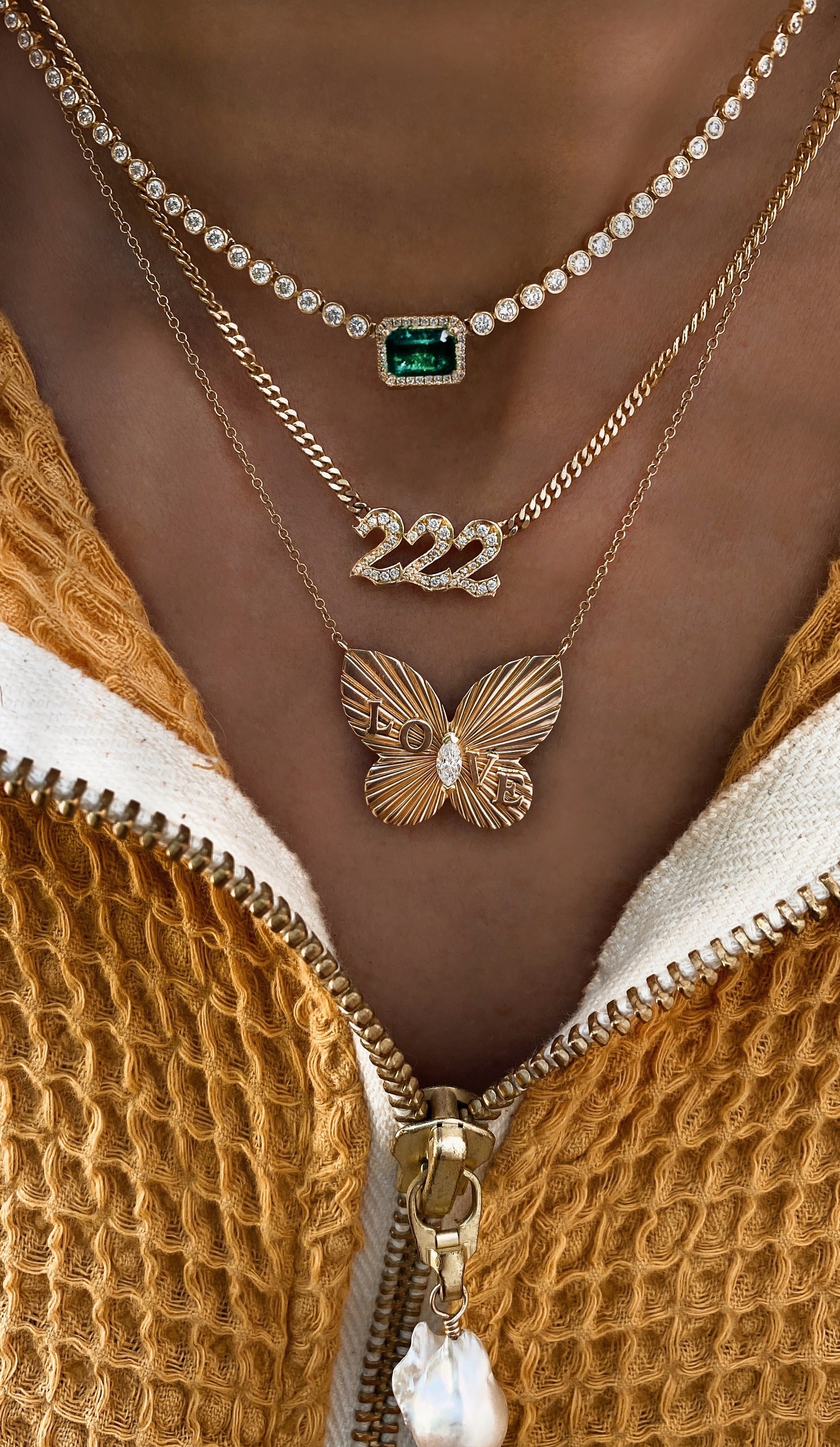 Yellow gold and diamond butterfly burst love necklace