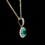 Yellow Gold 0.57 Carat Emerald and Diamond Pendant