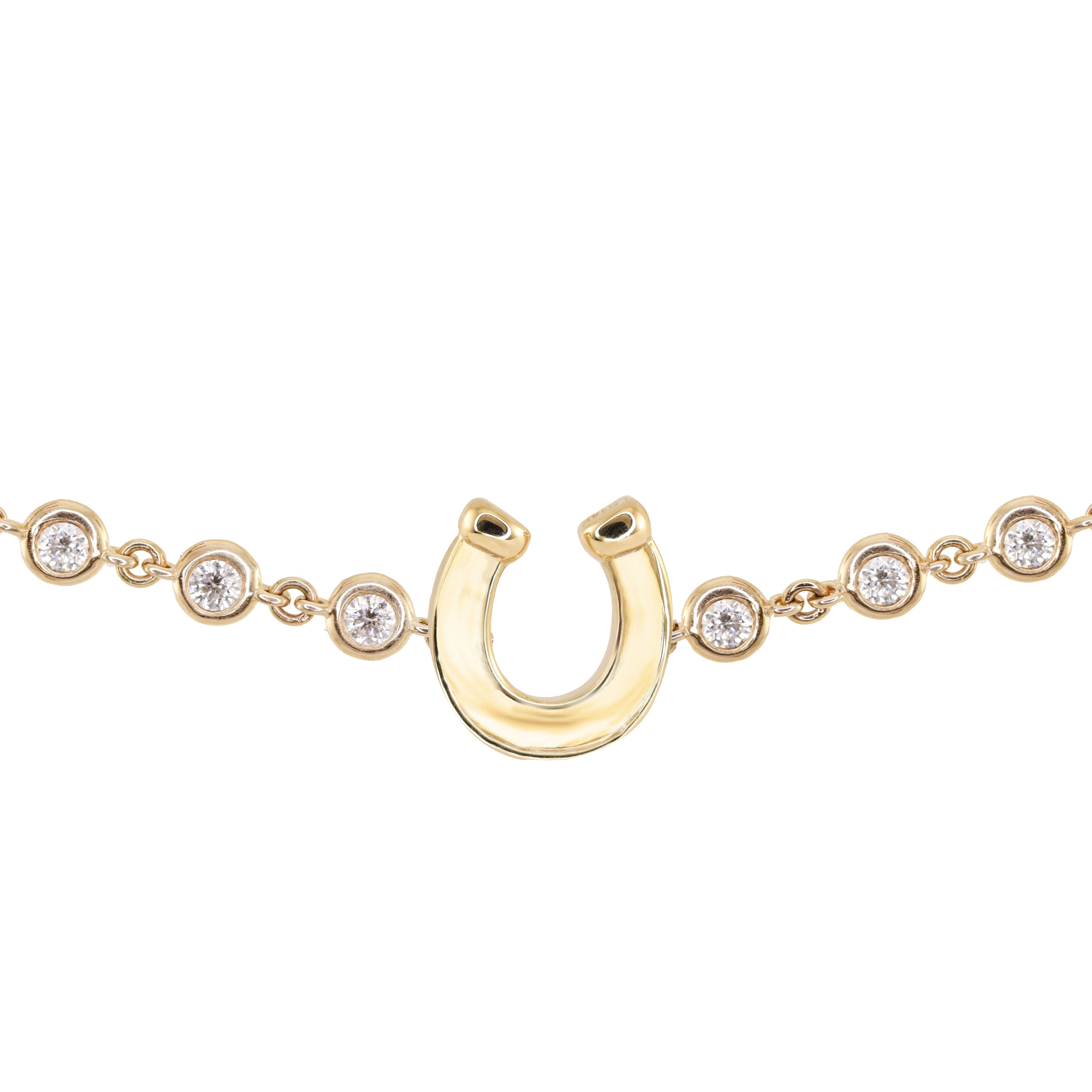 14kt gold diamond bezel horseshoe bracelet