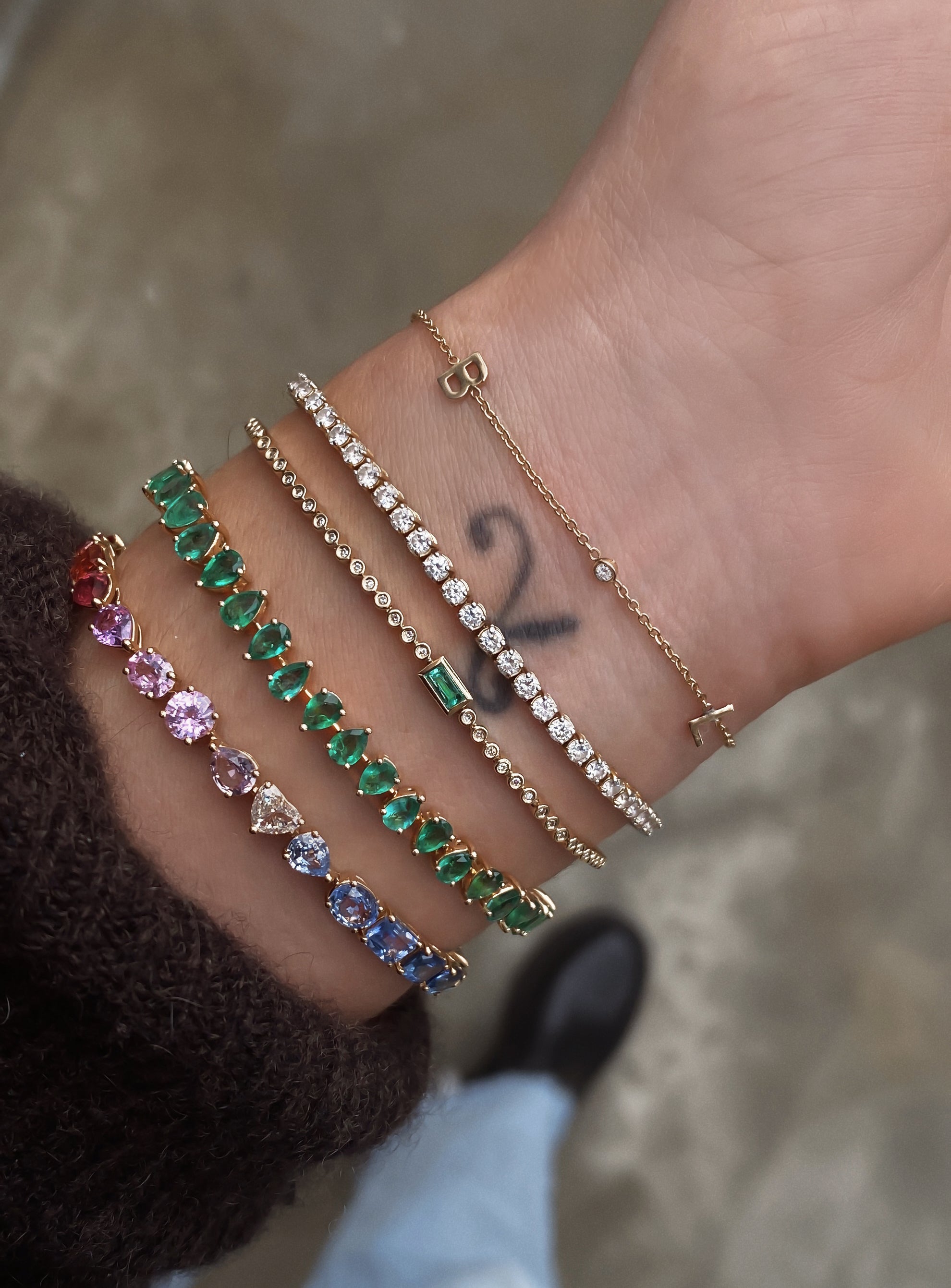 14kt gold teardrop emerald tennis bracelet